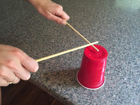 Don't have room for big buckets? Use cups and chopsticks!